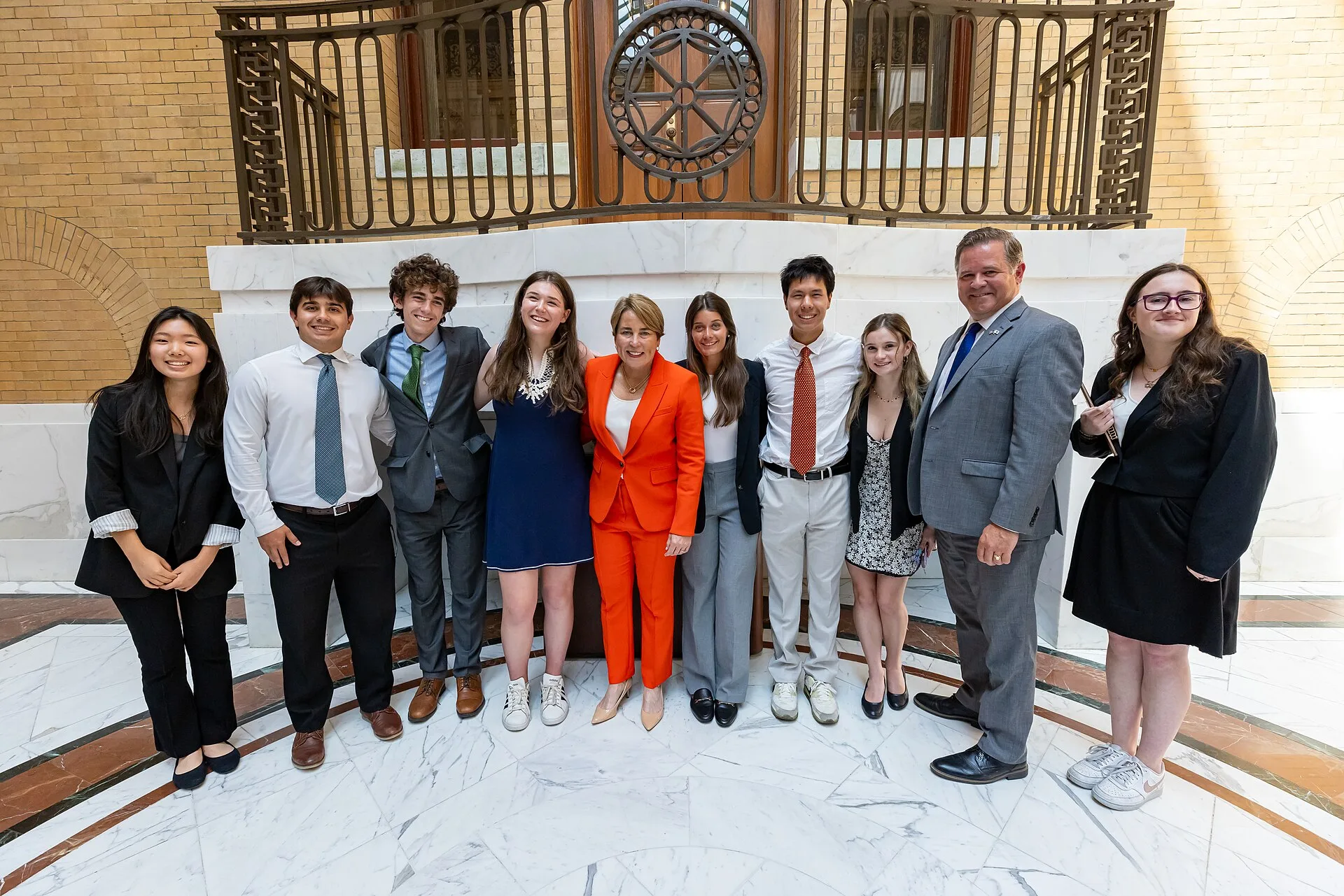 Governor Maura Healey and Secretary of Public Safety and Security Terrence Reidy join House Speaker Ronald Mariano, Senate President Karen Spilka, Joint Committee on the Judiciary Chair Rep. Michael Day, Sen. Cynthia Creem and Salisbury Police Chief Thomas Fowler, among other elected officials and a