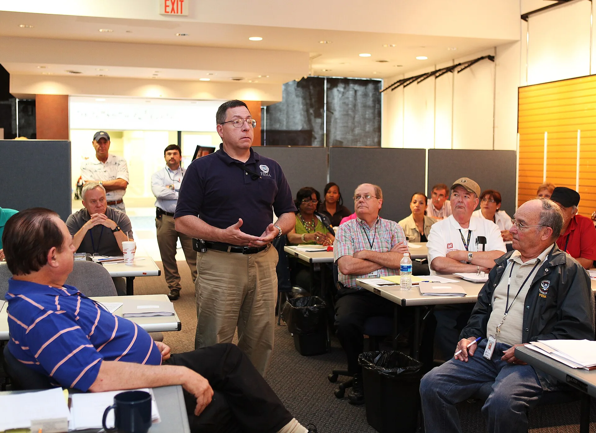 Nashville, TN, May 29, 2010 -- Steve Ward, FEMA Deputy Federal Coordinating Officer, joins discussions with Joint Information Center representatives as they provide media relations guidance to public assistance field inspectors and coordinators, hazard mitigation staff, and environmental and histori