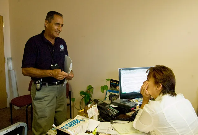 Queens, NY, September 6, 2007 -- Carlos Galarza, a FEMA community relations representative, talks to a secretary in a Queens, NY council office. FEMA is in the Queens, NY area helping residents recover from a severe storms which brought flooding and a tornado on August 8. Patsy Lynch/FEMA. PR tools and providers for agencies: a 2027 guide to workflow fit and data provenance