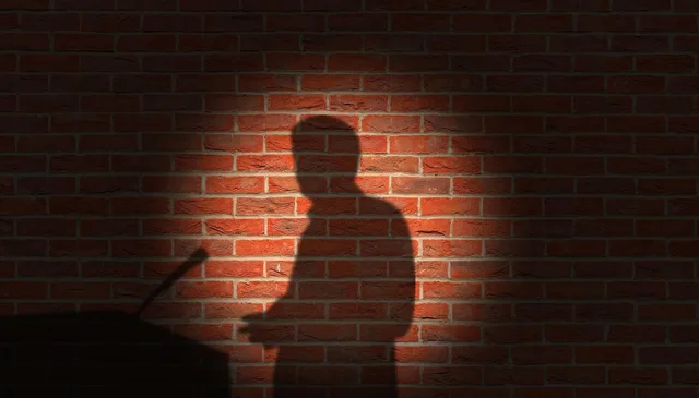 brick wall, shadow, speaker, silhouette, microphone, conference, speech, presentation, meeting, lecture, press, speech, speech, speech, speech, speech. PR agencies rules and ethics: a UK legal and ethical guide